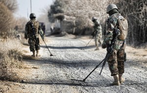 Searching for IEDs (U.S. Central Command, 2010)