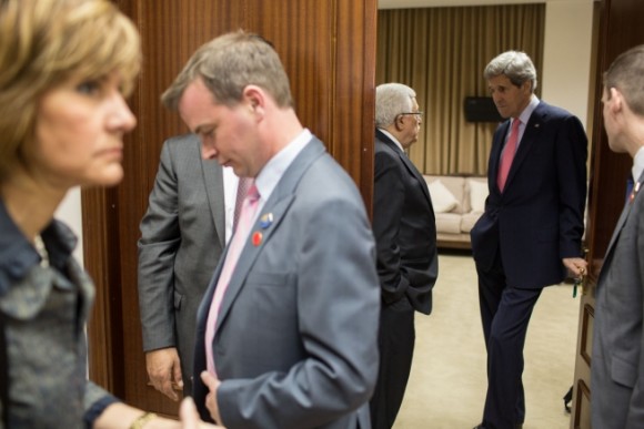 Secretary of State John Kerry speaks with President Mahmoud Abbas of the Palestinian Authority