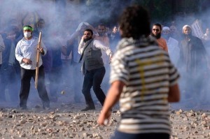 A street fight in Cairo over ousted Egyptian president Mohammed Morsi. Credit: Hisham Allam/IPS.