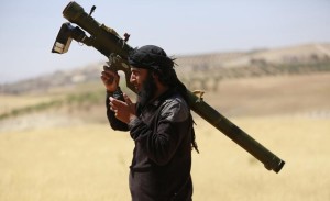 Walkie talkie courtesy of Hillary Clinton’s State Department. Missile launcher courtesy of Hillary Clinton’s Libya War.